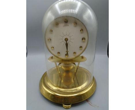 Kaiser dome clock with globe pendulum