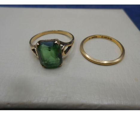  22ct wedding gold band 1.2gms and 9ct gold ring with large green stone 2.1gms