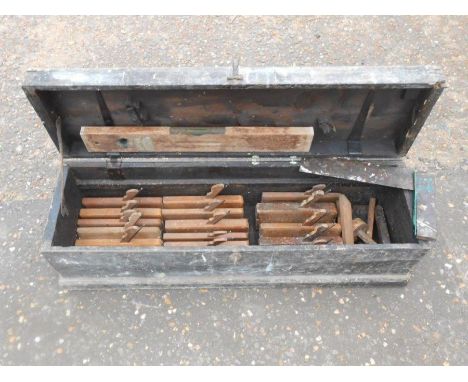 Wooden tool box with tools including moulding planes, marking gauges, spirit level etc