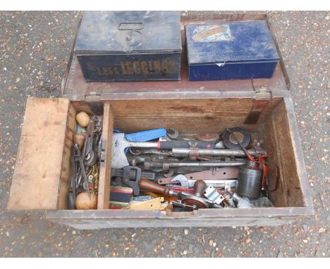 Wooden tool box with tools including stilsons wrenches, axe, compasses etc