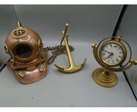 Brass divers helmet, compass clock and anchor with chain