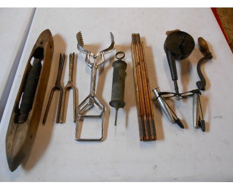 interesting tools lot to include a metal grabber, vintage bobbin, extending rule, mawson and son grease gun, test tube holder