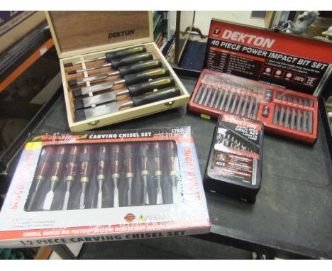 Two chisel sets, a 25 piece drill set and a 40 piece Power Impact bit set *