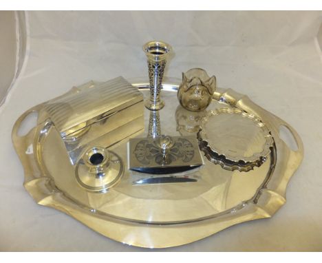 A silver plated twin-handled tray, together with a silver cigarette box, a loaded silver spill vase with blue glass liner, lo