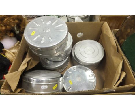 A box containing a selection of various early to mid 20th Century reel films of South America, Far East, etc