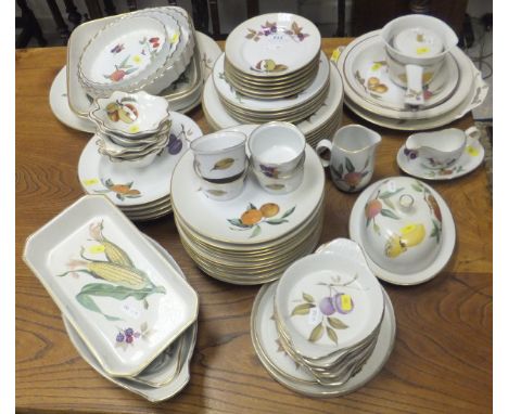 A Royal Worcester "Evesham" pattern part dinner and tea service to include butter dish, plates, ramekins, shaped bowls, servi