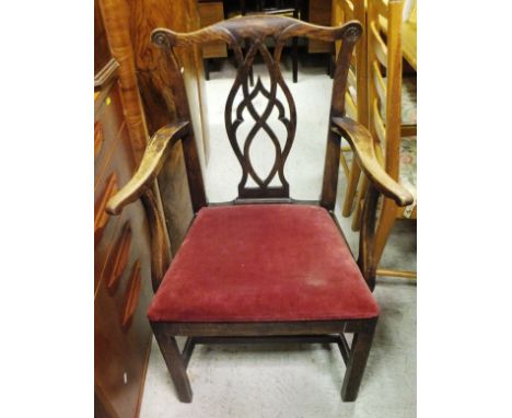 An assortment of five various 19th Century dining chairs with drop-in seats, a chest of four long drawers, and a tapestry fir