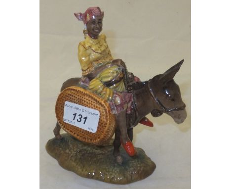 A Beswick pottery "Susie Jamaica" figurine depicting a girl riding a donkey, model No. 1347  CONDITION REPORTS General ware c