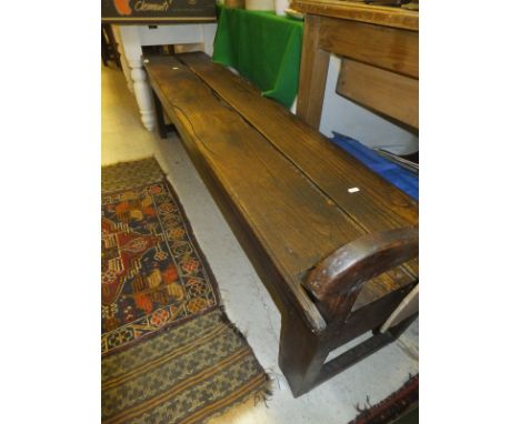 A French farmhouse inglenook bench in elm