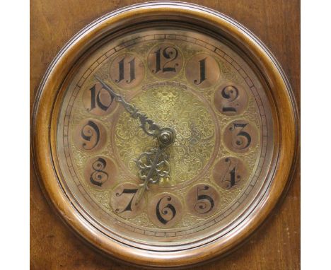 A late 19th Century German walnut cased long case clock, the stepped hood over a circular dial inscribed "C Jägermann Nacht. 