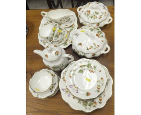 A Coalport "Strawberry" pattern part dinner and tea service to include two lidded tureens, coffee pot, gravy boat and stand, 