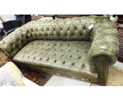 WITHDRAWN.  A green leather upholstered button back Chesterfield sofa