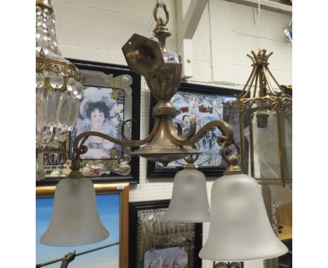 A brassed three branch ceiling light fitting in the early 20th Century taste with frosted glass shades 