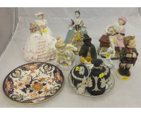 A collection of figurines and decorative china to include a Coalport "Rose" figure, No'd. 3266/12500, a Reg Johnson & Sons fi