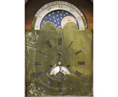 A circa 1800 oak and inlaid cased long case clock, the eight day movement with brass arched dial and sun and moon phase, surm