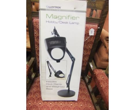 A magnifying table lamp *