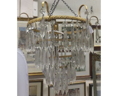 A four tier gilt metal light fitting with cut glass drops, together with a pair of brass framed hexagonal lantern light fitti