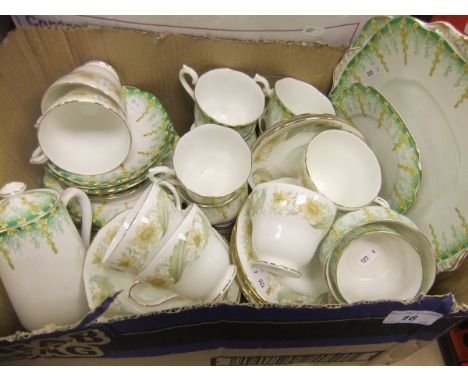 A box containing a Royal Albert "April Showers" part tea service, together with a Duchesse "Green Sleeves" part tea service