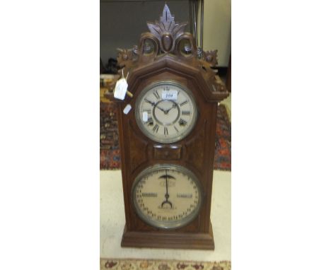 A walnut cased calendar mantel clock by the Ithaca Calendar Clock Co., Ithaca New York