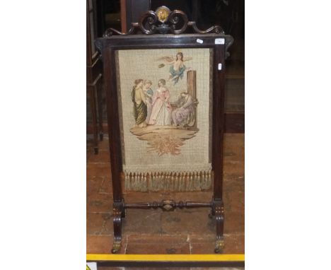 A 19th Century rosewood framed fire screen with petit point needlework decoration of figures with cherubs by pillars CONDITIO