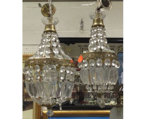Two gilt metal ceiling light fittings with cut glass drops
