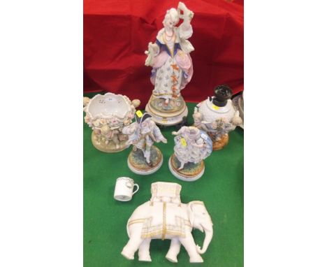 A Hadleys porcelain vase in the form of an elephant, a large Continental porcelain figure of a lady in 18th Century dress, a 