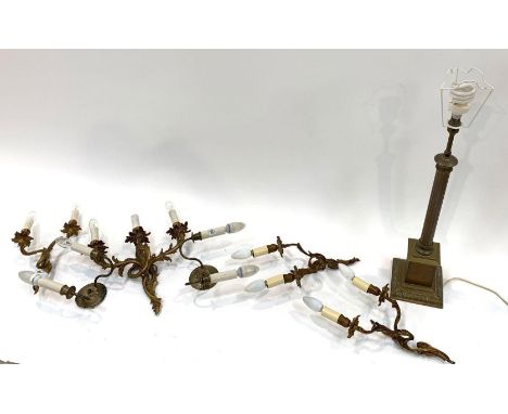 A brass Rococo style three branch wall light fitting, three matching two branch wall lights and a pair of two branch wall lig