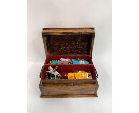 A small collection of vintage playworn Corgi vehicles together with other vehicles and models, all cased in a modern wooden b