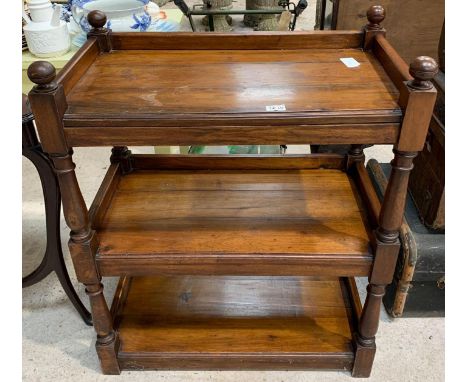 A Victorian mahogany three tier dumb waiter with turned supports, 77cms wide 83cms high to top shelf. Viewing/collection at W