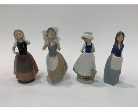 Four Nao figures including a girl with a poodle, 24cms high; girl holding a lamb 25.5cms high and two other girls. Viewing/co