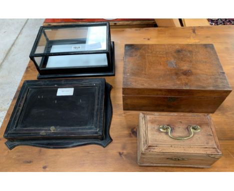 A walnut veneer writing slope, with a vacant copper shield to the top and black leather writing surface with gilt tooling, 15