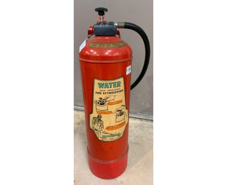 A vintage red painted Minimax water fire extinguisher, 66cm high. Viewing/collection at West Woodlands BA11 5ES. Payment at S