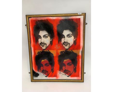 In the style of Andy Warhol a print of Prince with applied glitter and in gilt frame 75cms x 60cms. Viewing/collection at Wes