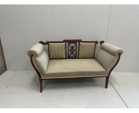 An Edwardian inlaid mahogany settee, width 150cm, depth 60cm, height 84cm. Condition - fair