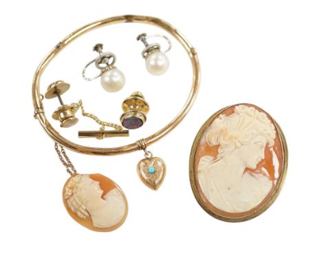 A 14k hinged bangle with turquoise set heart shaped drop, a pair of cultured pearl ear clips, two 9ct and black opal doublet 