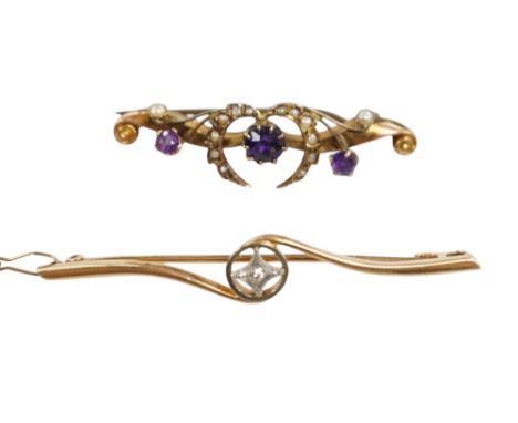 An Edwardian 15ct and diamond set crossover bar brooch, 57mm, gross weight 3.9 grams, together with a similar 9ct gold, ameth