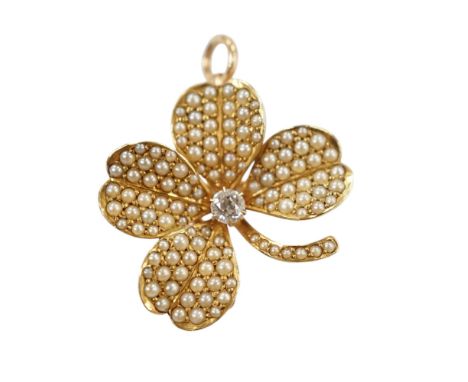 A 14k diamond and seed pearl set clover pendant brooch, width 21mm, gross weight 4.8 grams. Condition - fair to good