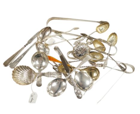 A collection of assorted small silver, sterling and white metal flatware, including two 19th century caddy spoons, enamelled 