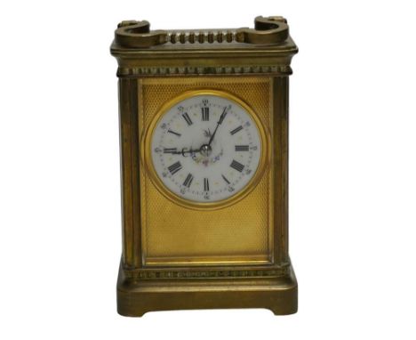 A brass cased carriage timepiece with enamel dial, with key, 15cm high. Condition - good, not tested