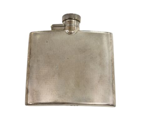 A George VI engine turned silver hip flask, Goldsmiths &amp; Silversmiths Co Ltd, London, 1937, 95mm. Condition - fair