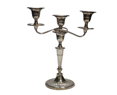 A late Victorian silver two branch, three light candelabrum, Edward Hutton, London, 1891, height 30.7cm, weighted. Condition 