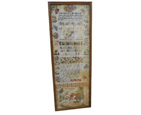 A 19th century framed alphabet sampler worked by M. Edlacher, overall 114cm high. Condition - poor