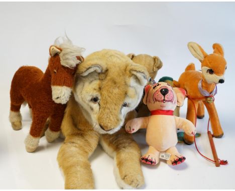 A large Merrythought tiger night-dress case, a Merrythought Bonzo the dog and other Merrythought items (6). Condition - fair 