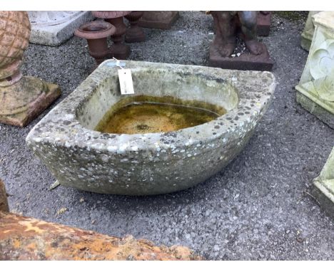 A granite corner trough, width 47cm, depth 40cm, height 19cm. Condition - fair