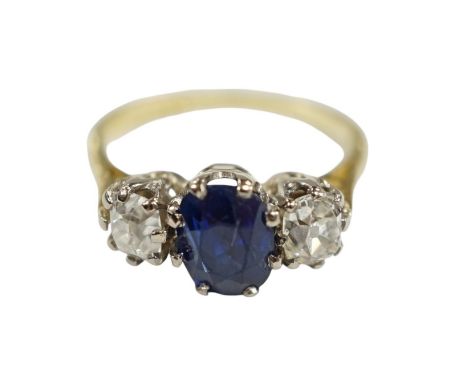 A 1970's 18ct gold, sapphire and diamond set three stone ring, size J/K, gross weight 3.8 grams. Condition - fair