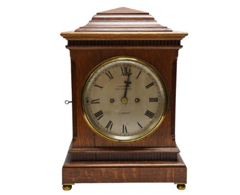 A mid 19th century oak eight day mantel clock, signed J. Jennens, Skinner St. London, pendulum, no key. 45cm. Condition - fai