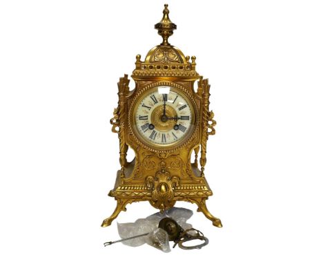 An early 20th century French ormolu mantel clock with key and pendulum, 33cm. Condition - good, not tested as working