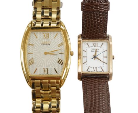 A gentleman's recent gilt metal Citizen Eco-Drive wrist watch and one other Citizen watch. Condition - poor to fair