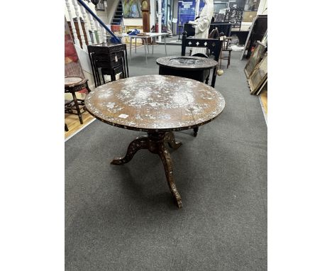 A circular Chinese export hardwood and mother of pearl inlaid centre table, diameter 85cm, height 64cm. Condition - fair