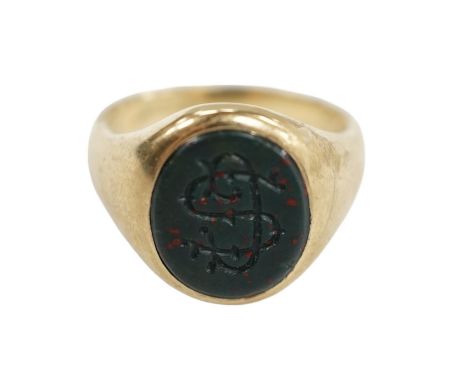 A 9ct gold and bloodstone set signet ring, with carved initial and interior inscription, size J/K, gross weight 5.9 grams. Co